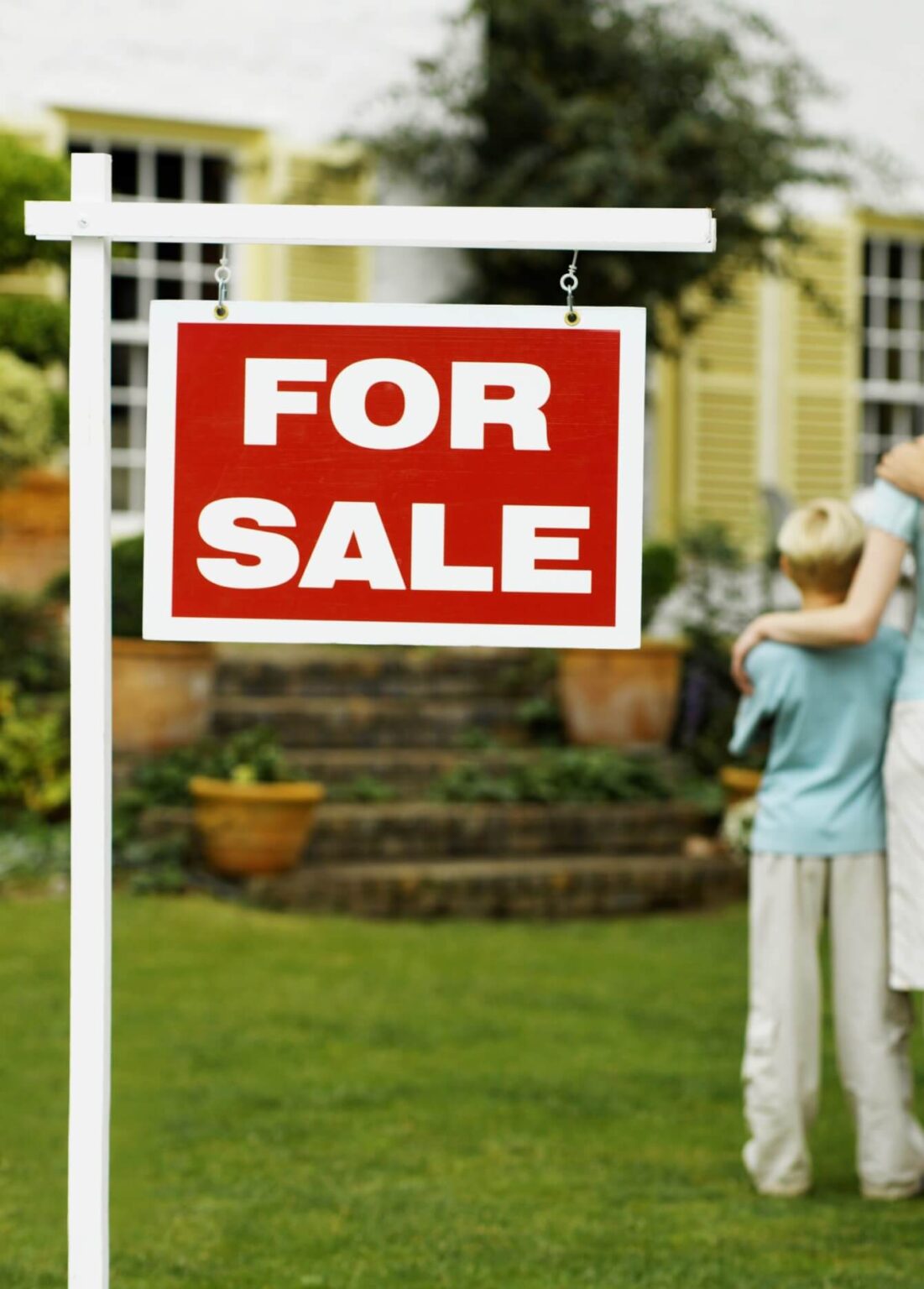 For Sale sign outside a home